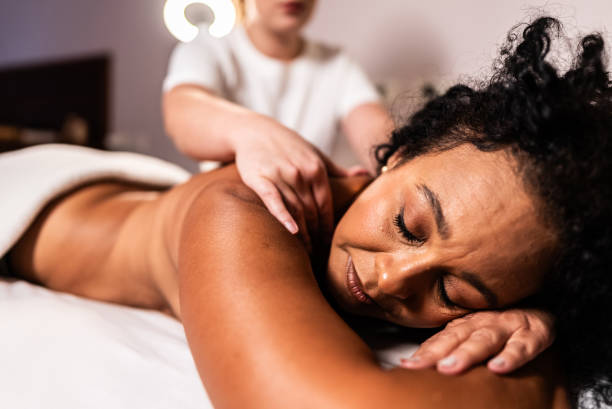 istock Mature woman doing massage on beauty spa 2165906766
