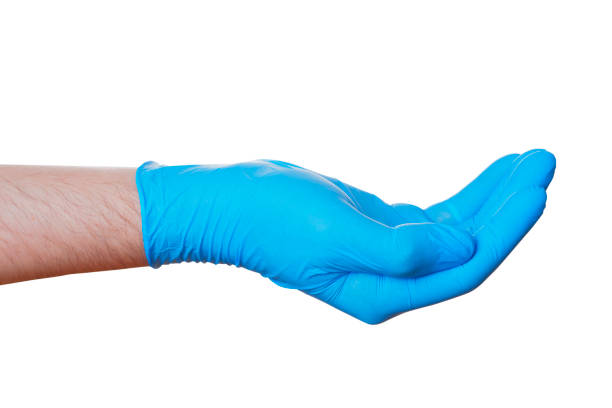 istock Open Hand In Blue Glove Ready For Medical Tools 2165907594