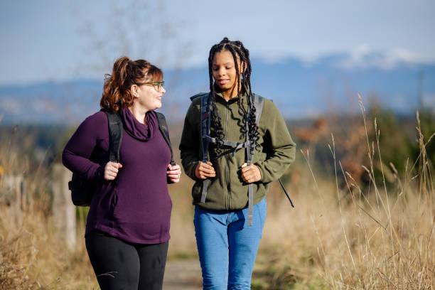 istock Multi Racial Mom and Daughter Winter Hike Together 2165910047