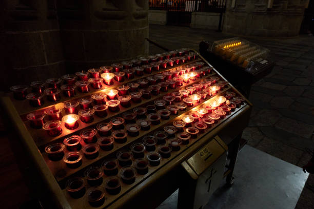 istock Furniture with lit and unlit votive candles 2165918565