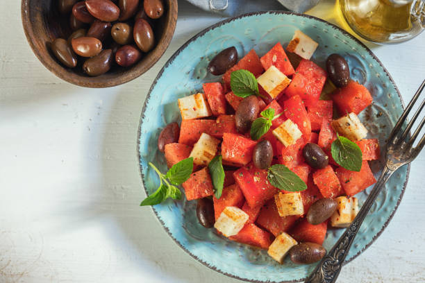 Watermelon salad with grilled halloumi cheese on a plate