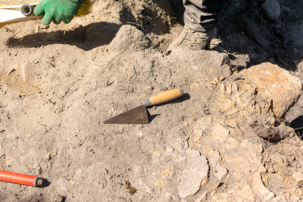 istock trowel on the ground in an archaeological dig, archeology concept 2165927603