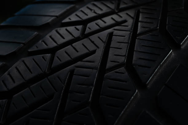 istock tire tread, tire traces background 2165928429