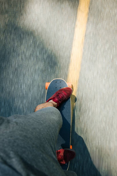 istock Person Riding Longboard 2165931586