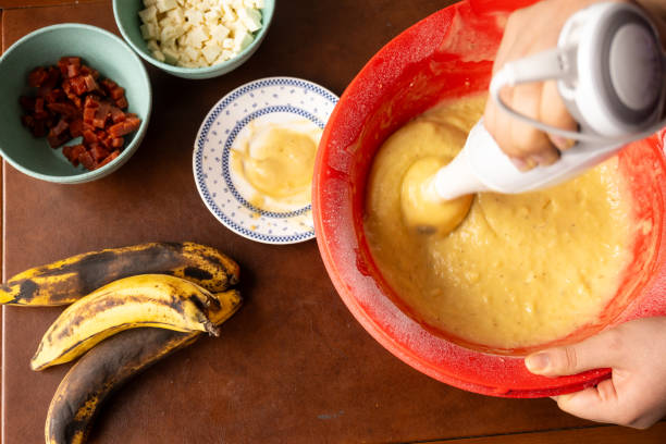 istock Beating banana cake in red pot 2165942466