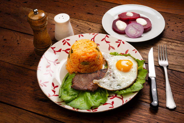 istock Steak of meat with fried eggs 2165946171