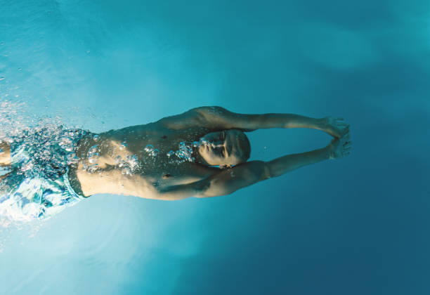 istock Young Male Diving 2165949719