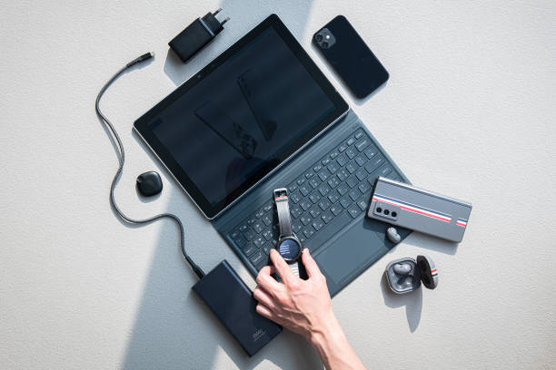 istock Chargers and cell phone keyboards on the table 2165956059