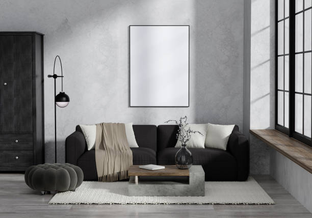 istock Modern Minimalist Living Room with Black Sofa, Large Window, and Blank Canvas on Wall 2165957271
