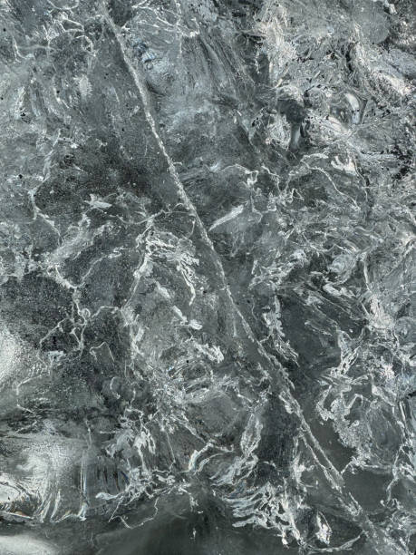 istock Close up of ice showing interesting texture and patterns 2165960925