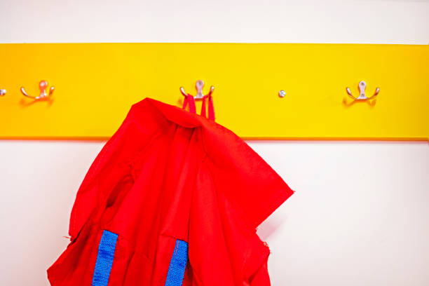 red work clothes on a yellow hanger in the interior
