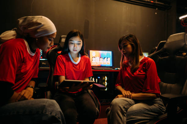 istock Game Plan Unveiled: Chinese Leader Consults with Diverse Pro-Gamer Team 2165961788