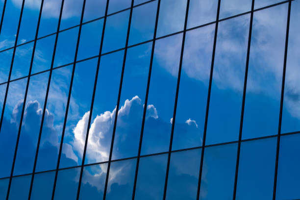 office building The building is adorned with glass. modern against the sky