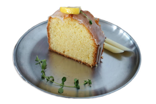 Lemon cake coated with sugar sweet icing. cake loaf.