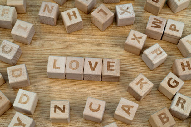 Wooden blocks with word love.