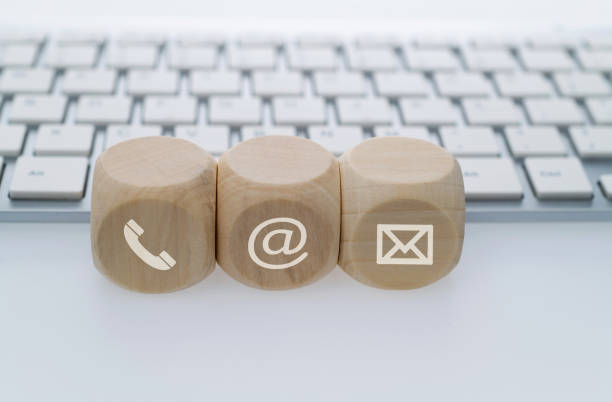 istock Contact us icons next to the computer keyboard 2165969185