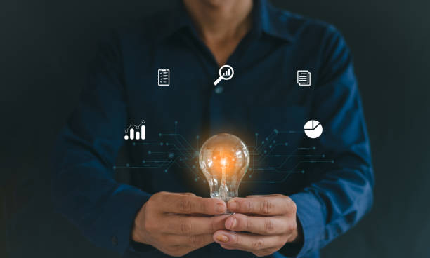 istock Men hold light bulbs, ideas, business, growth, cooperation. 2165969312
