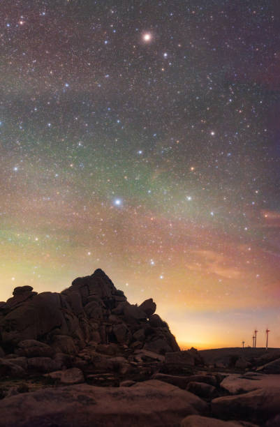 istock Colorful starry sky above the mountains 2165972378