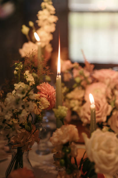 istock Dining table with flowers and candles 2165974338