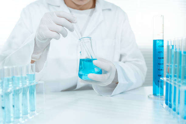 istock Scientist analyze biochemical samples in advanced scientific laboratory. Medical are mixing chemicals to test physical properties of cosmetic. develop viral. Biotechnology research in science lab. 2165975333