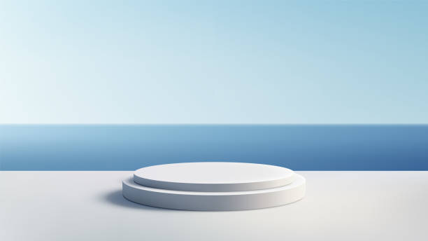 istock Minimalist 3D White Podium on White Surface with Serene Blue Ocean and Bright Sky Background for Product Display 2165975924