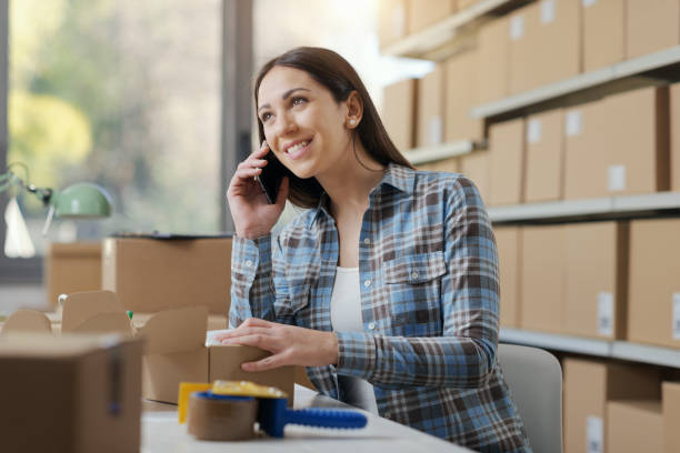 istock Woman taking customer orders on the phone 2165978506