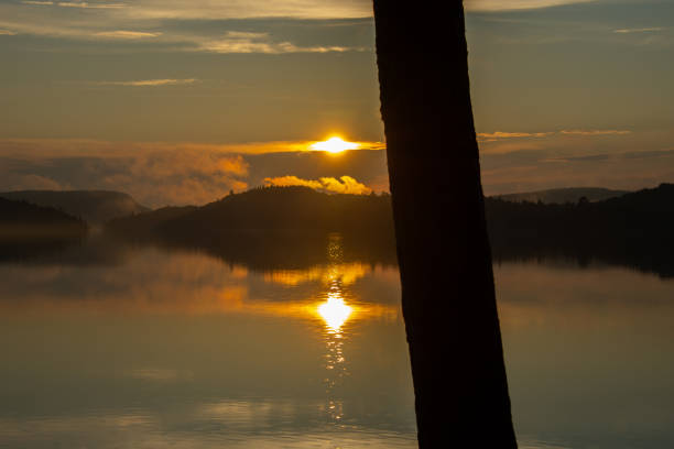 Sunset over a magnificent fishing lake in the Canadian forest