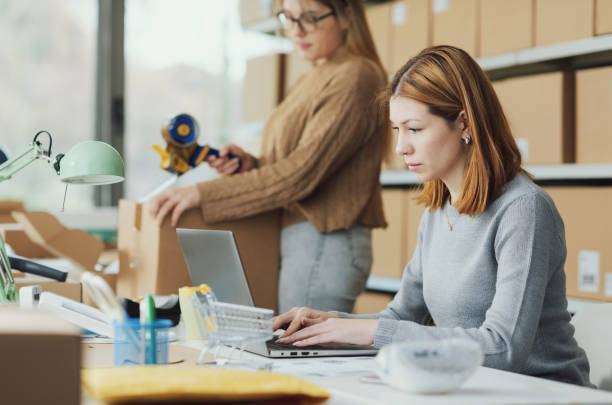 istock E-commerce business owners working in their store 2165984116
