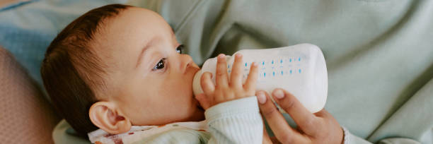 istock Baby Boy Drinking Kids Formula 2165987445