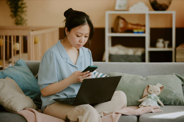 istock Asian Young Woman Working Remotely 2165987939
