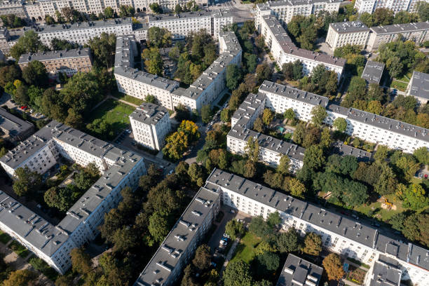 istock Apartment buildings and trees from above 2165988197
