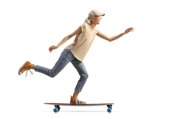 istock Female skater riding a longboard 2165989538