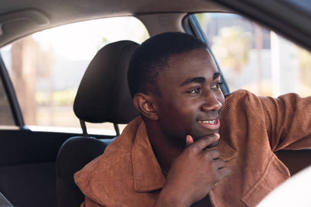 istock Cheerful black man in car 2165990350