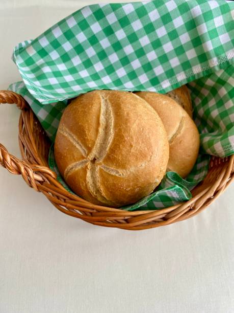 istock delicious bread in small basket 2165995359
