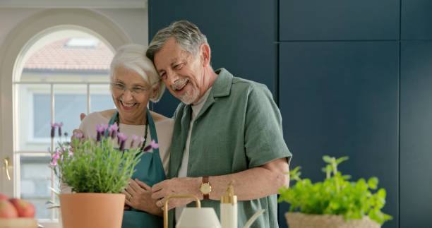 istock Senior couple gardening at home 2166000512