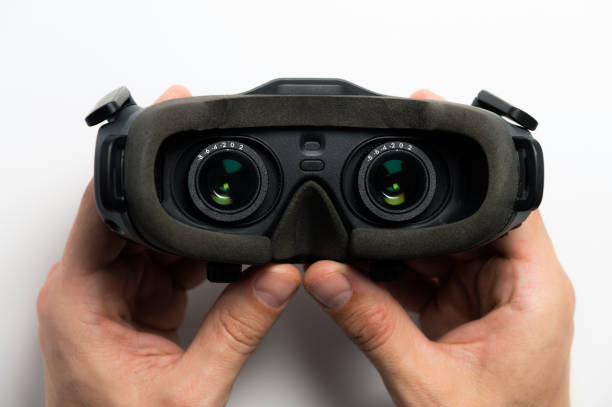 istock Black fpv or virtual reality glasses with lenses, on a white background. Close-up view from inside 2166005877
