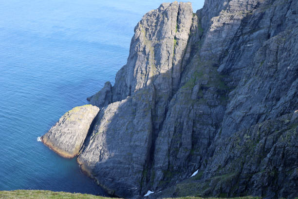 Norway: -The North Cape is a cape jutting into the Arctic Ocean on the north side of the Norwegian island of Magerøya.