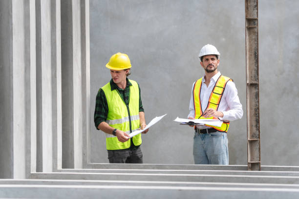 istock Engineer and foreman worker team inspect the construction site, Site manager and builder on construction site 2166008314