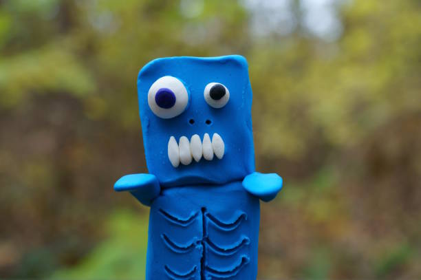 Zombie figures with funny faces. Halloween decorations.