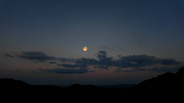 istock Full Moon, stars and landscape scenery silhouettes. 2166014086
