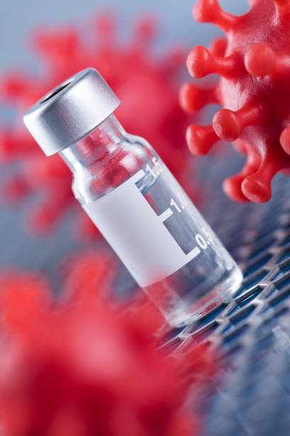 istock Bottles coronavirus vaccine, pandemic background 2166017843