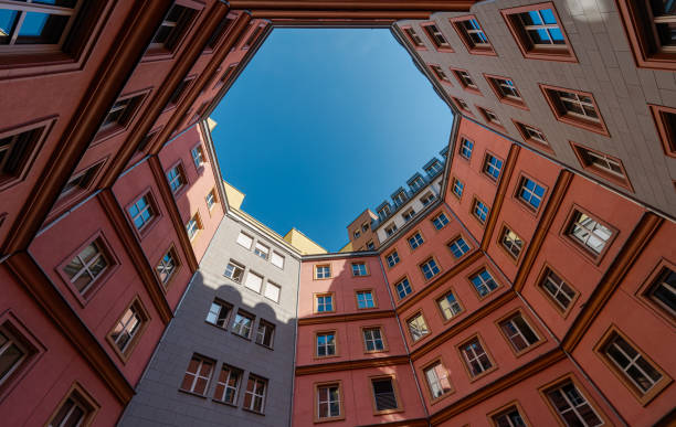 Germany, Berlin, Kreuzberg, August 06, 2024 -Low angle view of red apartment building