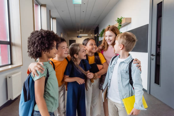 istock Multicultural kids celebrating back to school 2166021693
