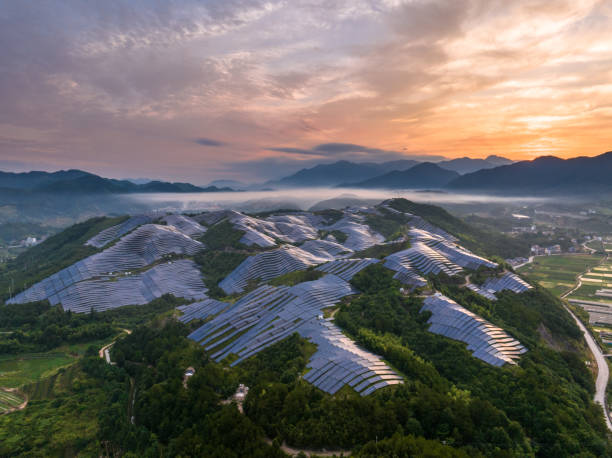 istock view of solar power station on hill 2166025543