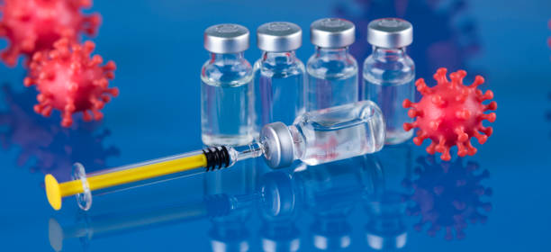 istock Close up medical syringe with a vaccine 2166027144