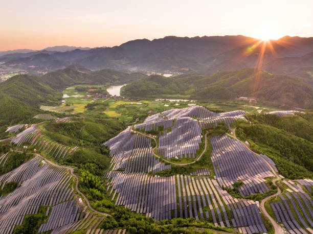 istock view of solar power panels on hill 2166027184