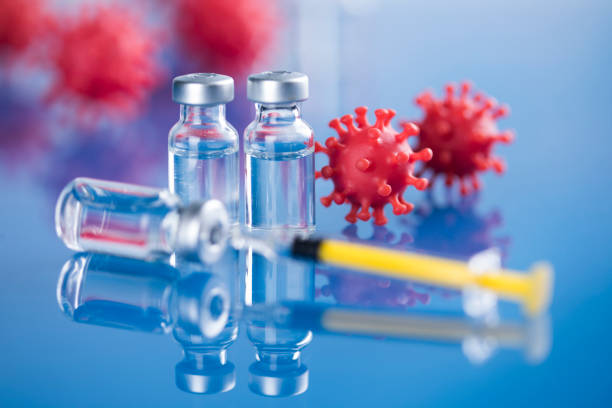 istock Close up medical syringe with a vaccine 2166027329