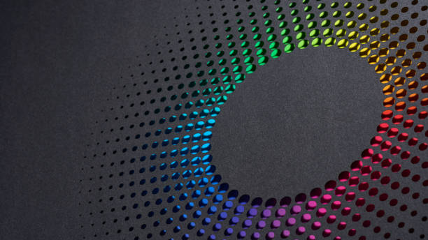istock Vibrant dotted paper design forming a circular gradient pattern with a full spectrum of rainbow colors. 2166030872