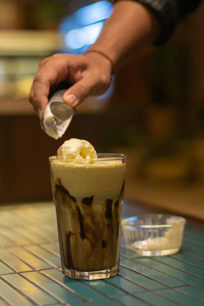 istock Put ice cream into a glass to make float drink 2166032288
