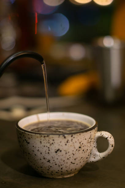 istock Pouring hot water into a cup 2166032458
